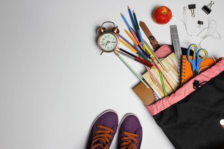 Backpack and supplies school on isolated background back to school concept copy space Stock Photo